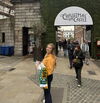 Image of Hailey in front of the Christmas Castle entrance 